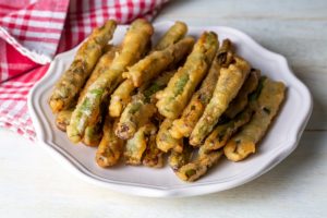 Fasole verde pane pe o farfurie